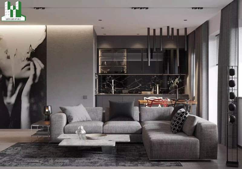 Bộ sofa màu xám kết hợp tường và tấm thảm đốm, các yếu tố như ánh sáng đèn, bức tranh treo tường, gối sofa làm cho độ tương phản trông tự nhiên hơn rất nhiều.